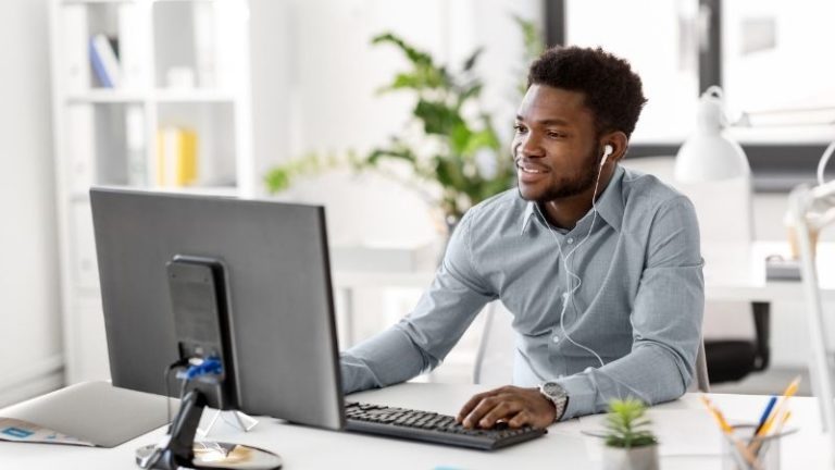 man listening to podcast