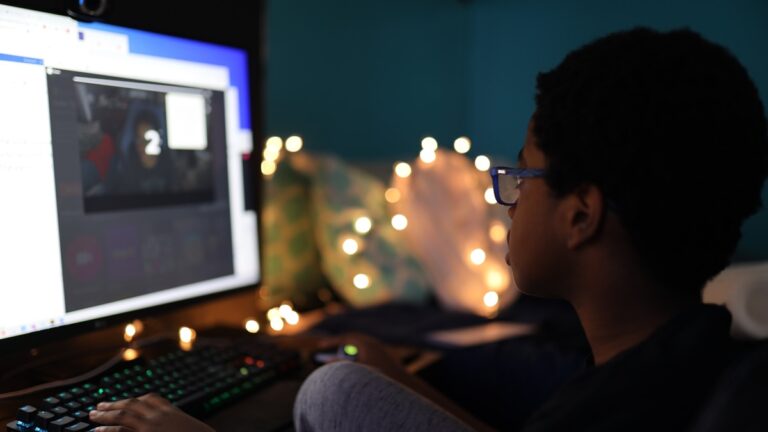 teen working on computer